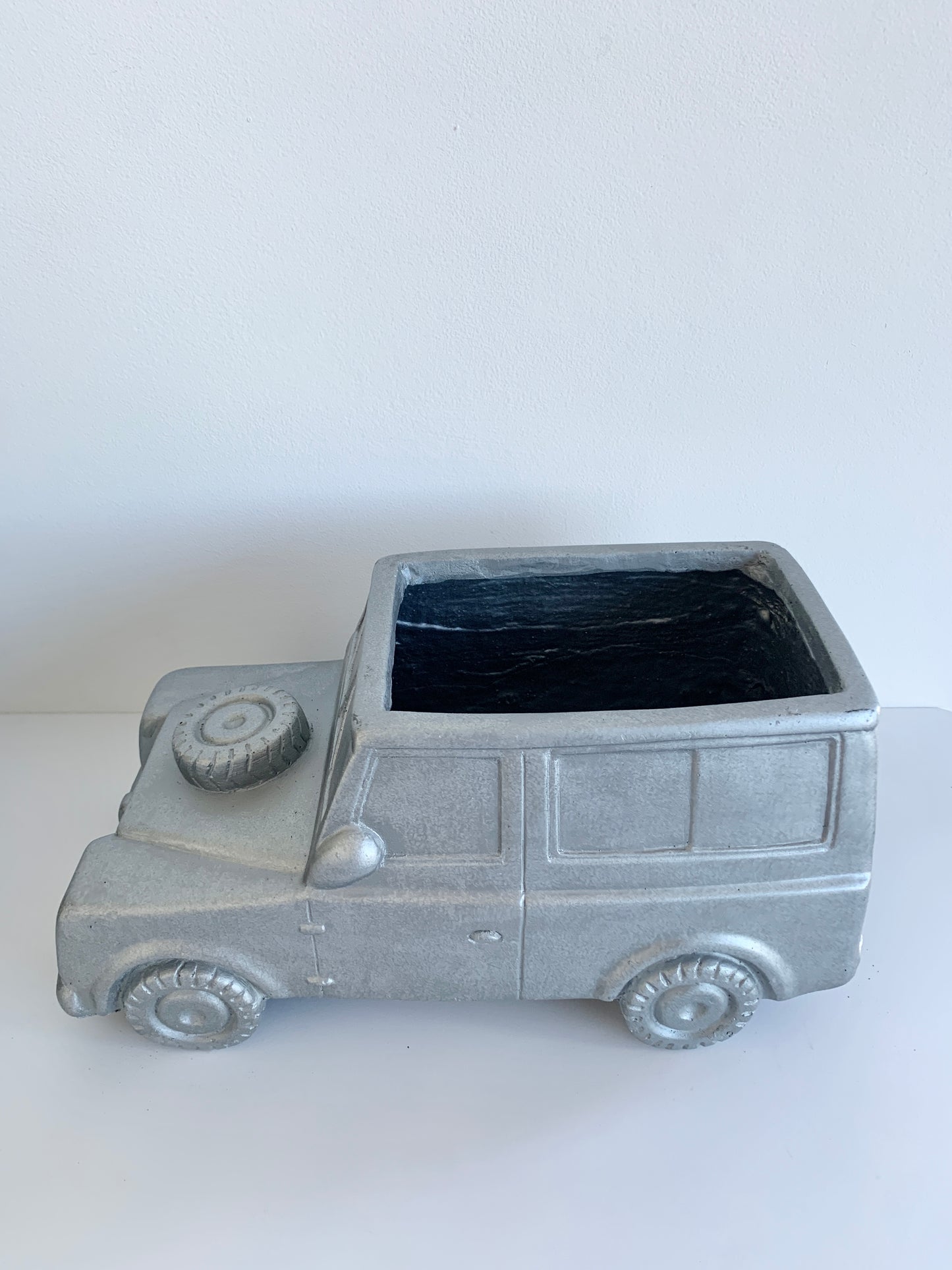 Silver Landrover antique pot